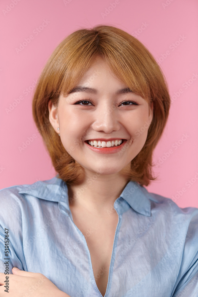 Portrait of a modern woman smiling broadly Portrait of a modern woman smiling broadly