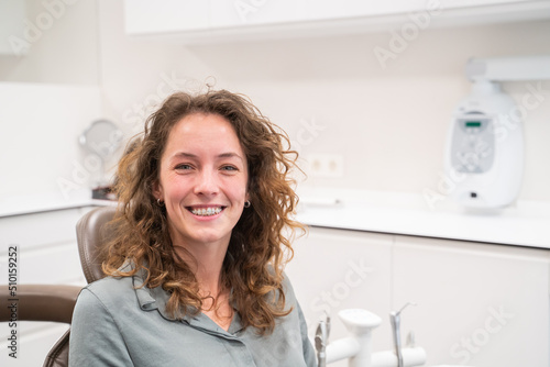 Patient With Clear Braces In Dental Clinic photo