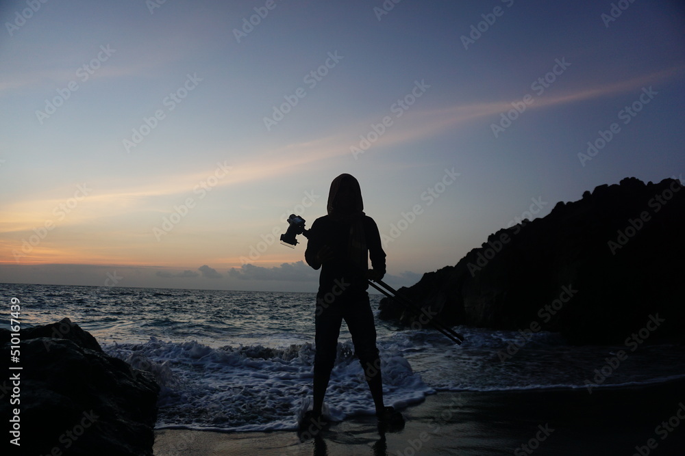 silhouette of photographer