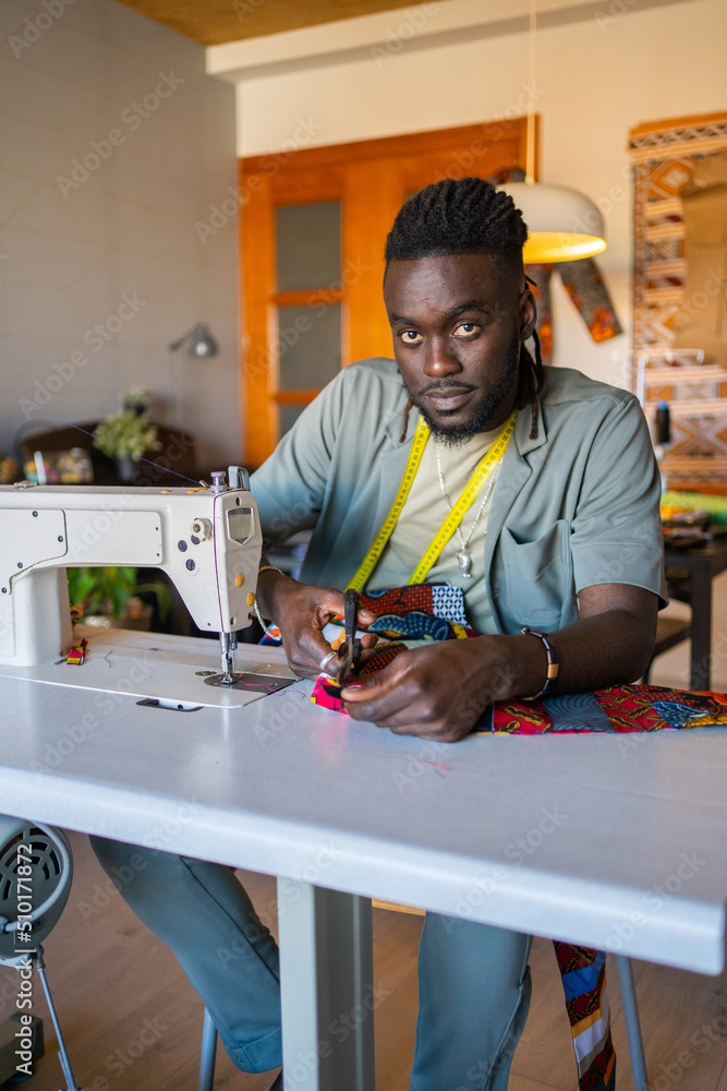 Portrait Of A Tailor, Man In A Fashion Design Studio. Portrait Of A Tailor, Man In A Fashion Design Studio.