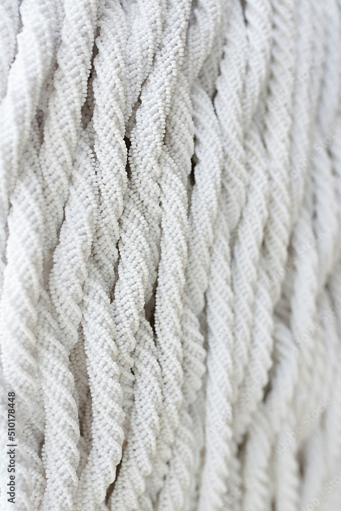 white beaded weaving texture close up white beaded weaving texture close up