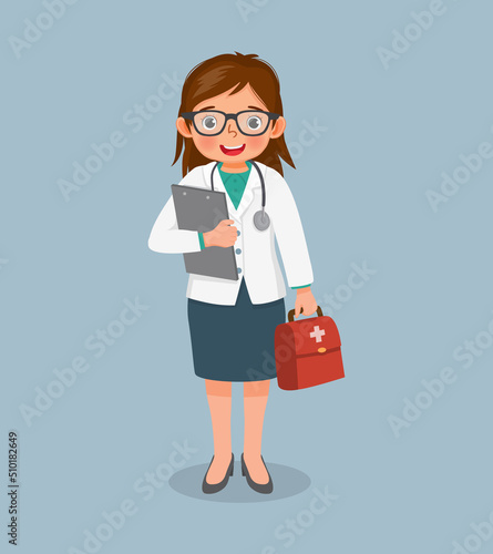 cute little girl with stethoscope wears doctor uniform holding clipboard and medical bag. Job and occupation concept for educational purpose