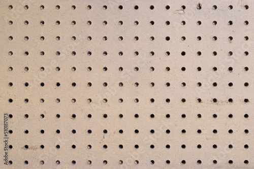 Classic Brown Pegboard Background photo