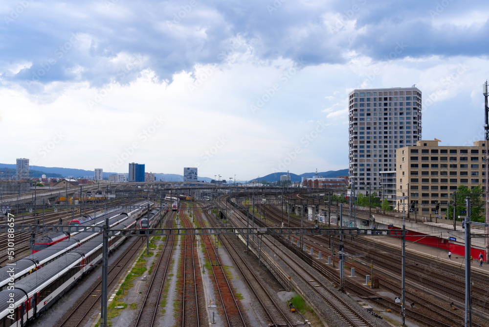 Railway track field with parked trains at railway station Hard Bridge at City of Zürich on a sunny spring day. Photo taken April 28th, 2022, Zurich, Switzerland. Railway track field with parked trains at railway station Hard Bridge at City of Zürich on a sunny spring day. Photo taken April 28th, 2022, Zurich, Switzerland.