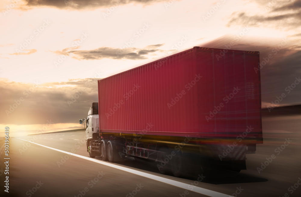 Semi Trailer Truck Driving on the Road with The Sunset Sky. Shipping Freight Truck. Logistics Cargo Transport Semi Trailer Truck Driving on the Road with The Sunset Sky. Shipping Freight Truck. Logistics Cargo Transport