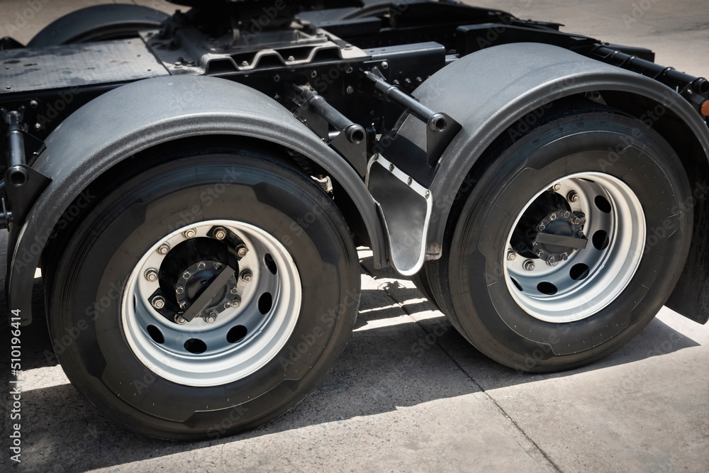 Rear of Semi Truck Wheels Tires. Rubber, Vechicle Tyres. Freight Trucks Cargo Transport. Auto Repair Service Shop. Rear of Semi Truck Wheels Tires. Rubber, Vechicle Tyres. Freight Trucks Cargo Transport. Auto Repair Service Shop.
