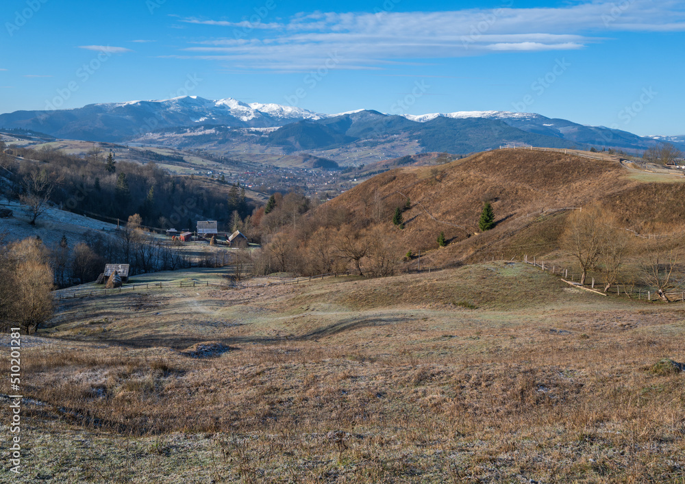 Last good weather days in autumn mountain countryside morning peaceful picturesque scene. Ukrainian Carpathians mountains in far. Last good weather days in autumn mountain countryside morning peaceful picturesque scene. Ukrainian Carpathians mountains in far.