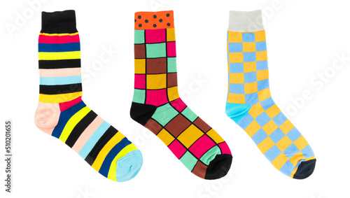 One sock with different lines isolated on white background. Colorful sock son white background. Colored socks on the leg isolated on white background