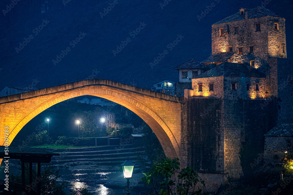 Mostar Bridge at Night with Lights, Bosnia and Herzegovina. The Old Bridgeon Neretva River. Stari Most.