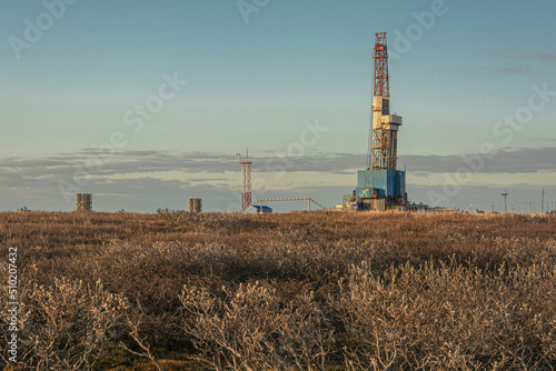 A general view of a drilling rig for drilling wells at an oil and gas field in the Arctic region. Winter. Day. Drilling equipment and technical infrastructure