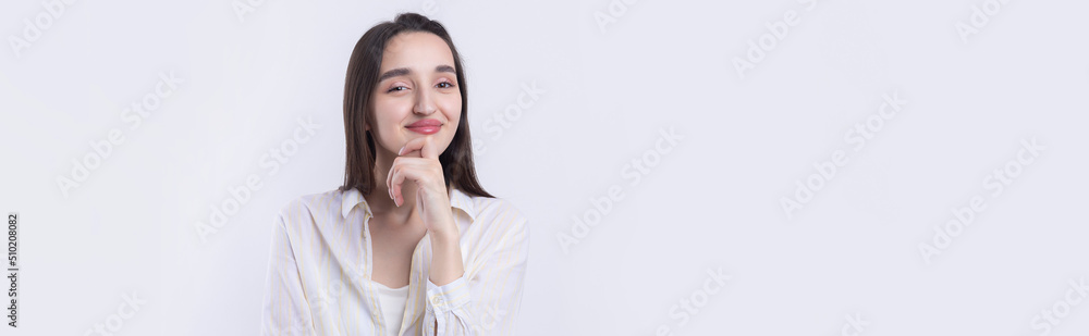 Portrait of a beautiful young woman thinking, isolated on white background Portrait of a beautiful young woman thinking, isolated on white background