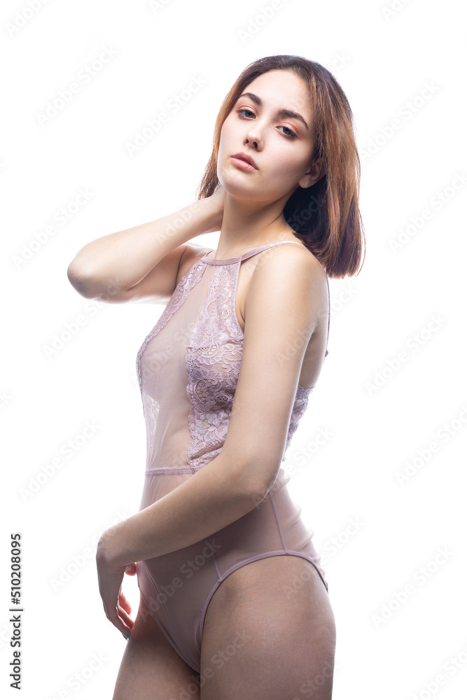 Fototapeta premium Beautiful sexy lady in elegant nude bodysuit. Fashion beauty portrait of fashion model girl.