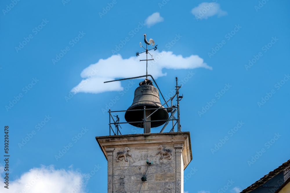 Bell against the sky, on a tower, on a sunny spring afternoon, Troyes, France