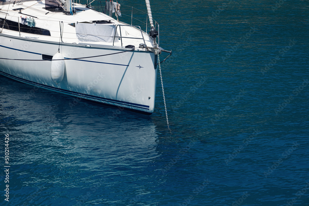 Fototapeta premium View from the deck of the overseer. Bow of the ship. Ship in open sea is showing the bow in a summer day. Boat bow sailing in blue Mediterranean sea in summer vacation. Travel concept