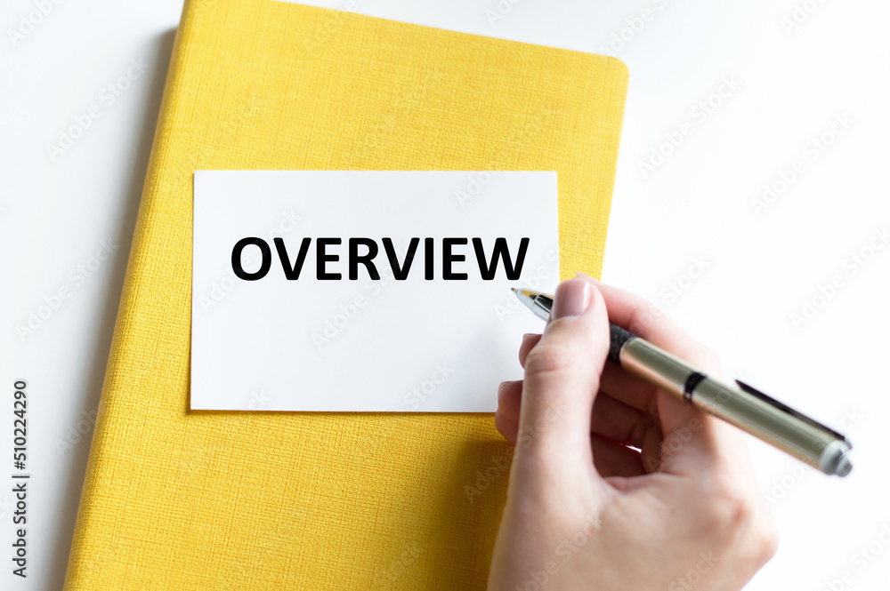 a white blank card with the text OVERVIEW. Business concept a white blank card with the text OVERVIEW. Business concept