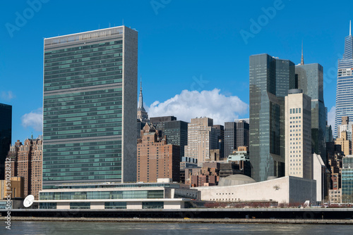  New York City skyscrapers on the river canal. High-quality photo