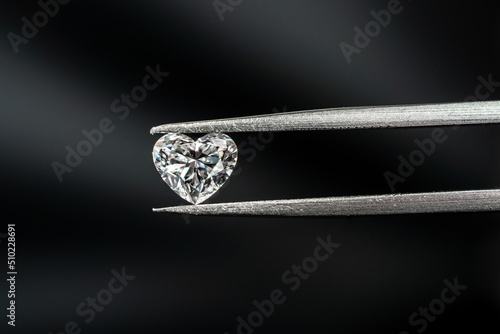Heart shape diamond with tweezers © pv