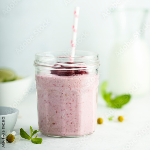 Healthy raspberry smoothie in the jar
