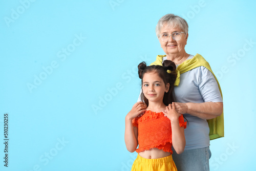 Senior woman with her littl...