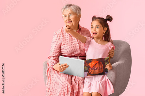 Senior woman with her littl...