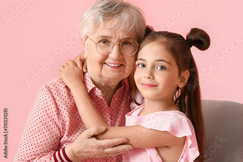 Senior woman with her littl...