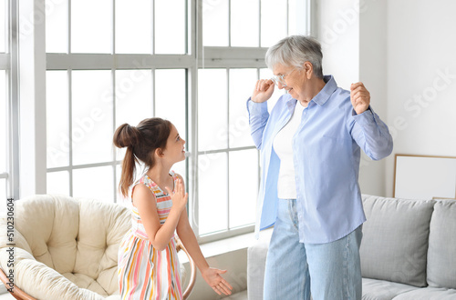 Little girl with her grandm...