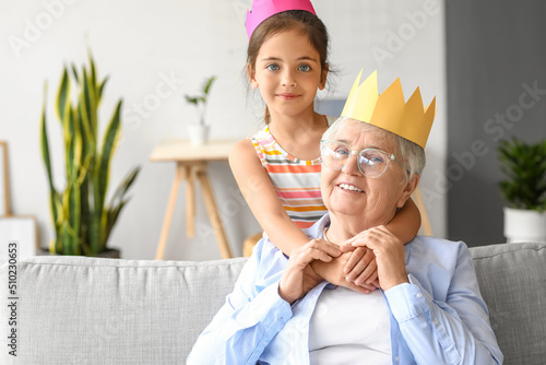Little girl with her grandm...