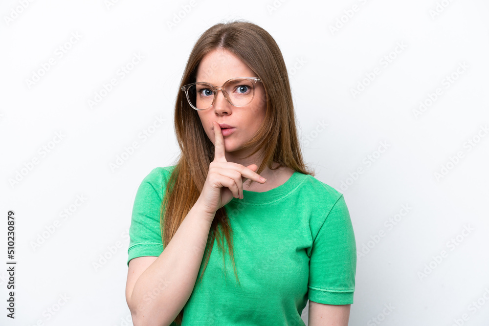 Young caucasian woman isolated on white background With glasses and doing silence gesture Young caucasian woman isolated on white background With glasses and doing silence gesture