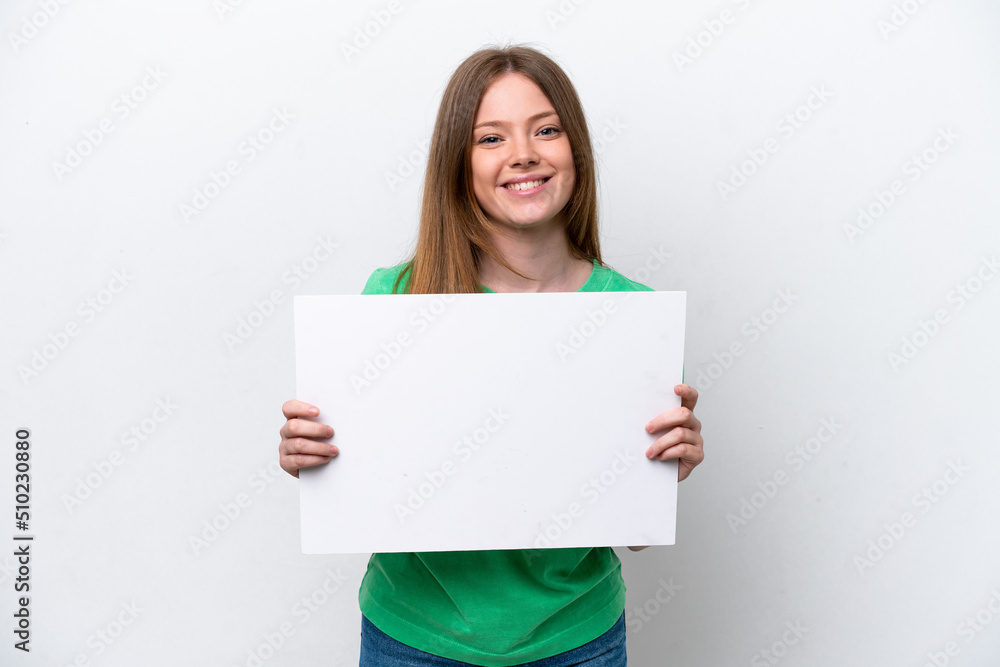 Young caucasian woman isolated on white background holding an empty placard with happy expression Young caucasian woman isolated on white background holding an empty placard with happy expression