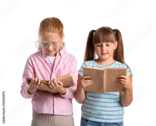 Little girls reading books ...