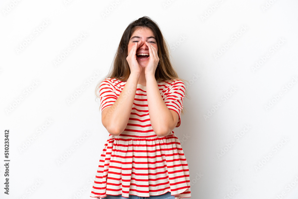 Young caucasian woman isolated on white background shouting and announcing something Young caucasian woman isolated on white background shouting and announcing something
