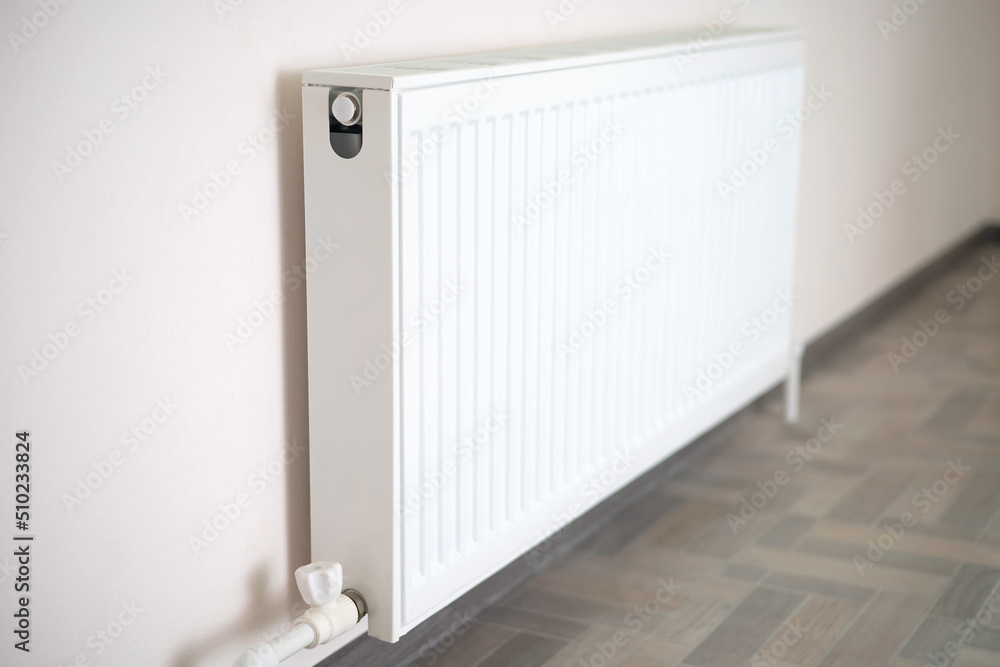 Radiator heating in a bright room. Energy. home renovation Radiator heating in a bright room. Energy. home renovation