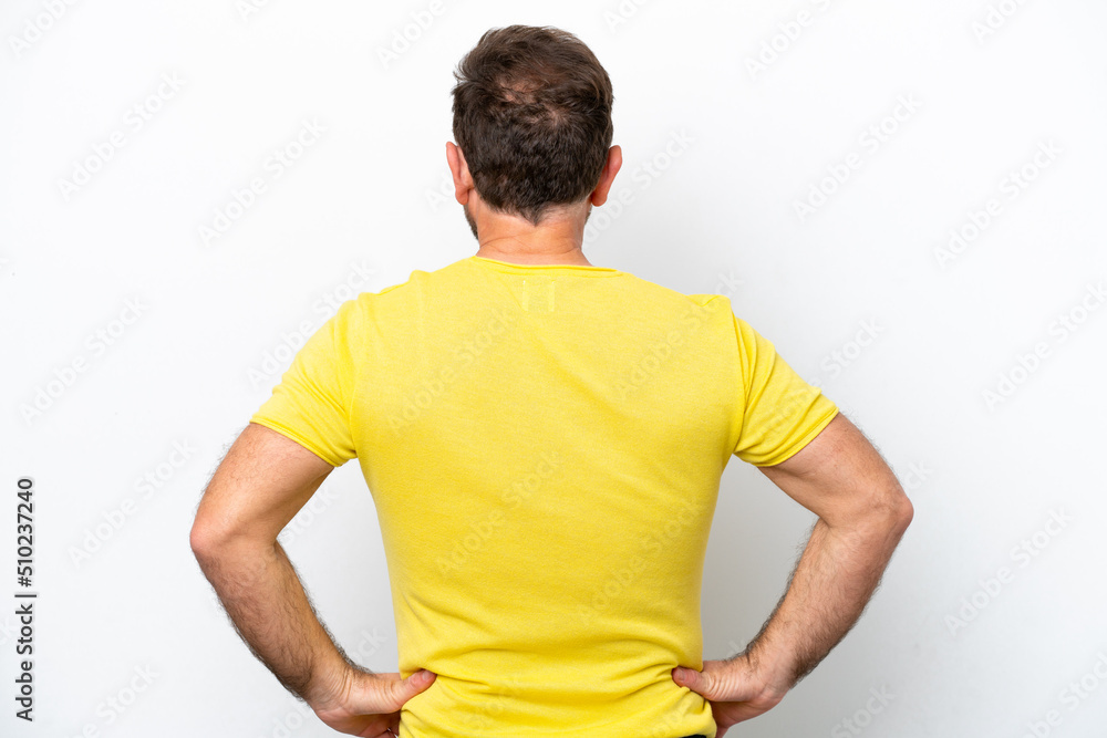 Middle age caucasian man isolated on white background in back position Middle age caucasian man isolated on white background in back position