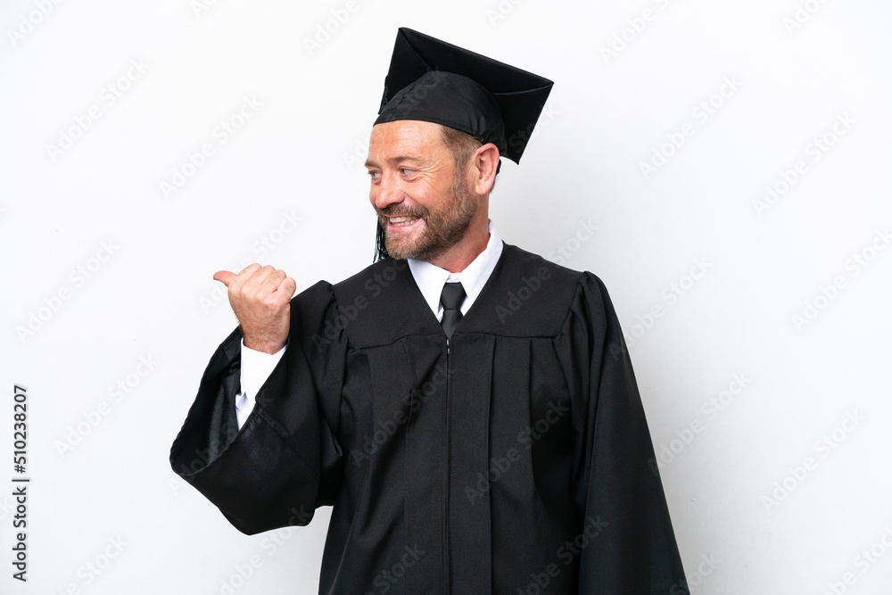 Middle age university graduate man isolated on white background pointing to the side to present a product Middle age university graduate man isolated on white background pointing to the side to present a product