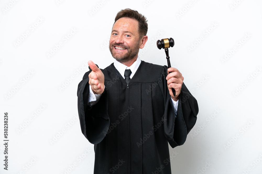 Middle age judge man isolated on white background shaking hands for closing a good deal Middle age judge man isolated on white background shaking hands for closing a good deal