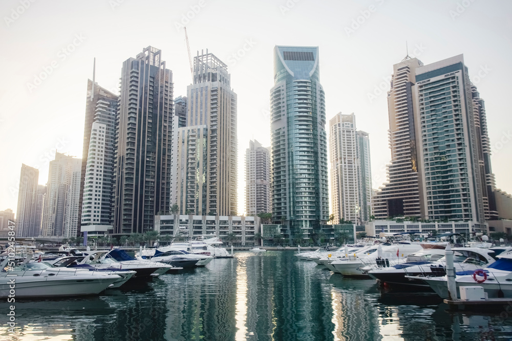 Fototapeta premium Dubai Marina with Luxury Yacht harbor and modern glass towers, Dubai, UA