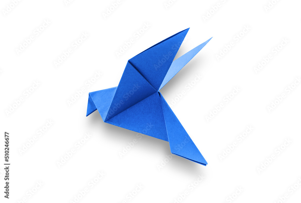 Blue paper dove origami isolated on a white background Blue paper dove origami isolated on a white background