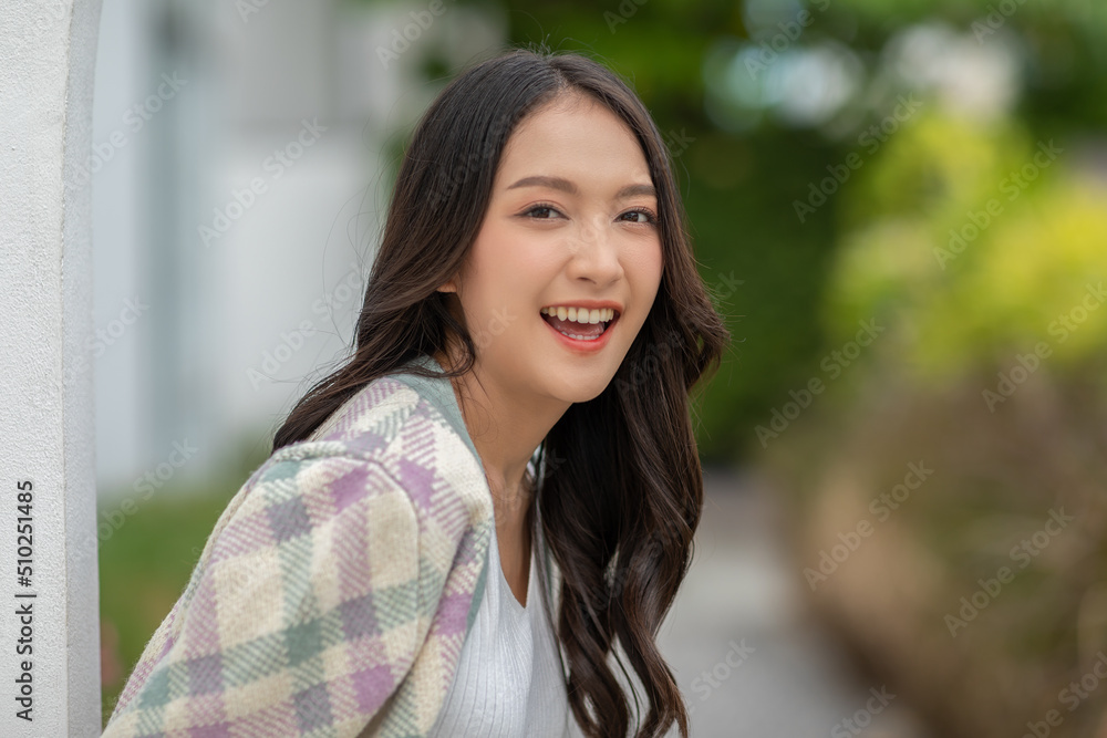 Beautiful asian young woman smile and cheerful. Confident cute female looking at camera relax and happiness with wellness life. good moment and positive emotional. Happy woman enjoy her life concept Beautiful asian young woman smile and cheerful. Confident cute female looking at camera relax and happiness with wellness life. good moment and positive emotional. Happy woman enjoy her life concept