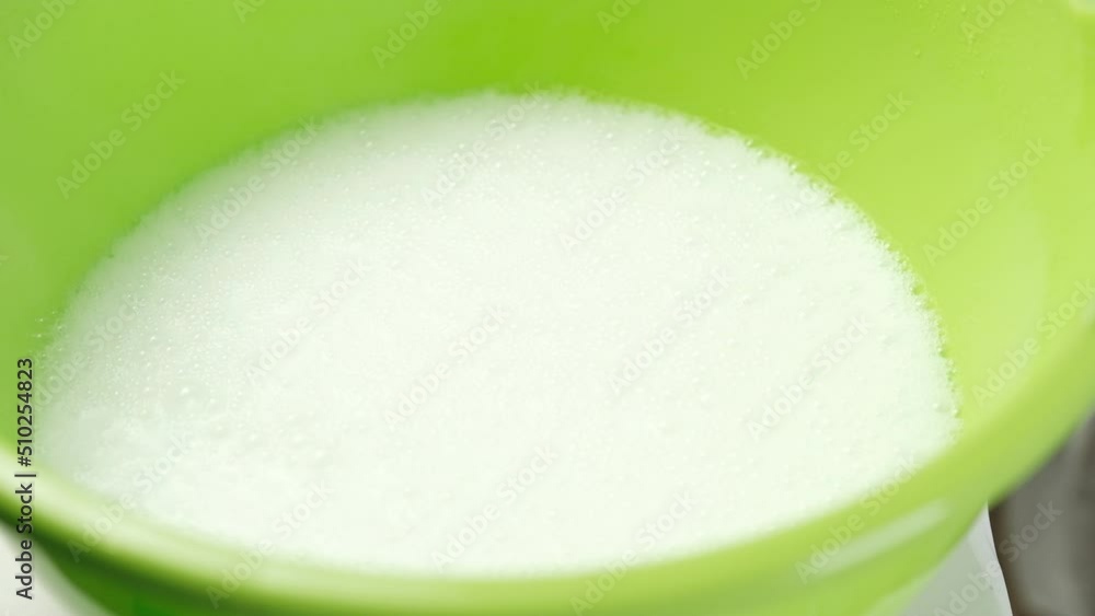 The active appearance of foam from the interaction of washing powder with hot water. The active appearance of foam from the interaction of washing powder with hot water.