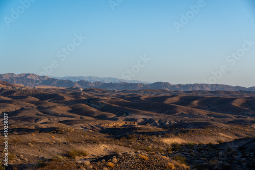 View of the Nevada Landscape with Highway in the background © porqueno