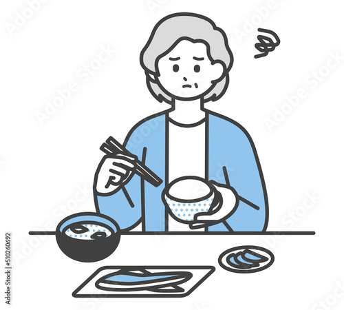 食事をする高齢女性のイラスト素材