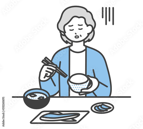 食事をする高齢女性のイラスト素材