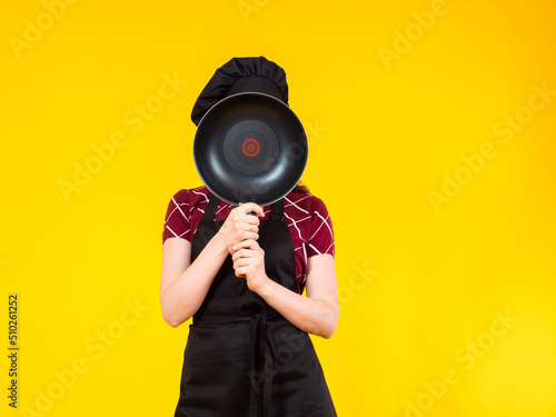 Chef covers his face with f...