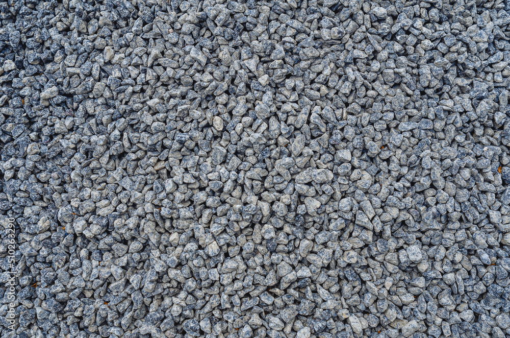 Obraz premium Abstract stone texture. Fine gray gravel. Small gray stones. Building material.