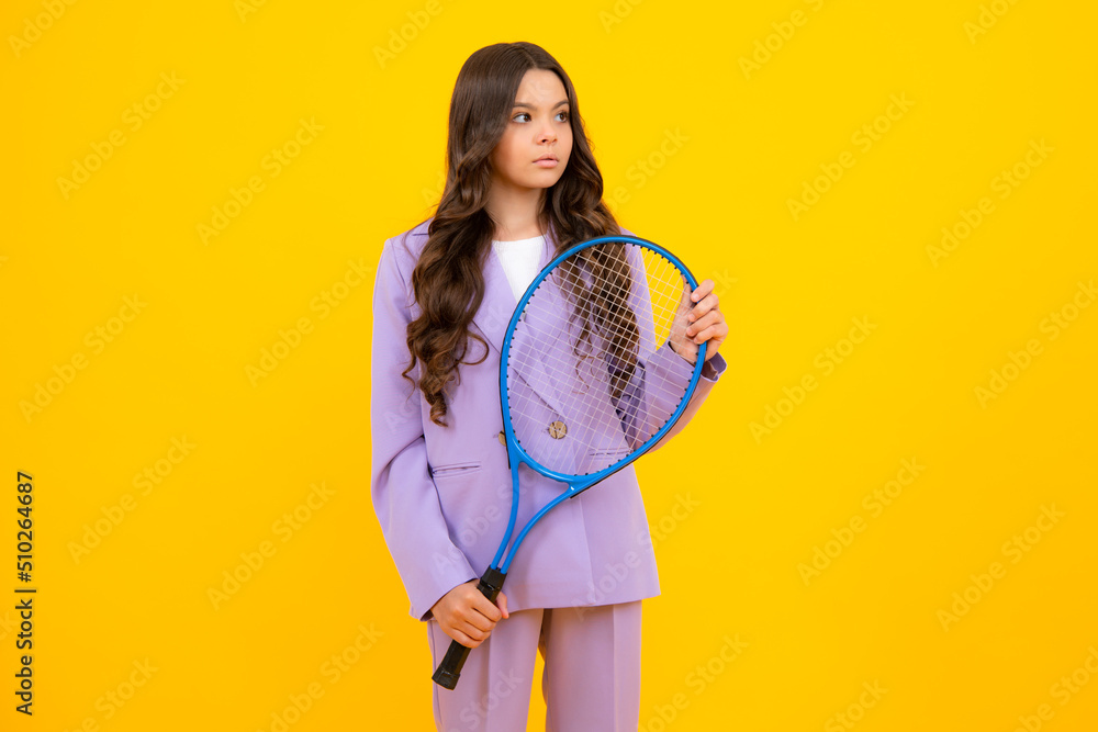 Teenager tennis player girl hold tennis racket over isolated yellow background. Teenager tennis player girl hold tennis racket over isolated yellow background.