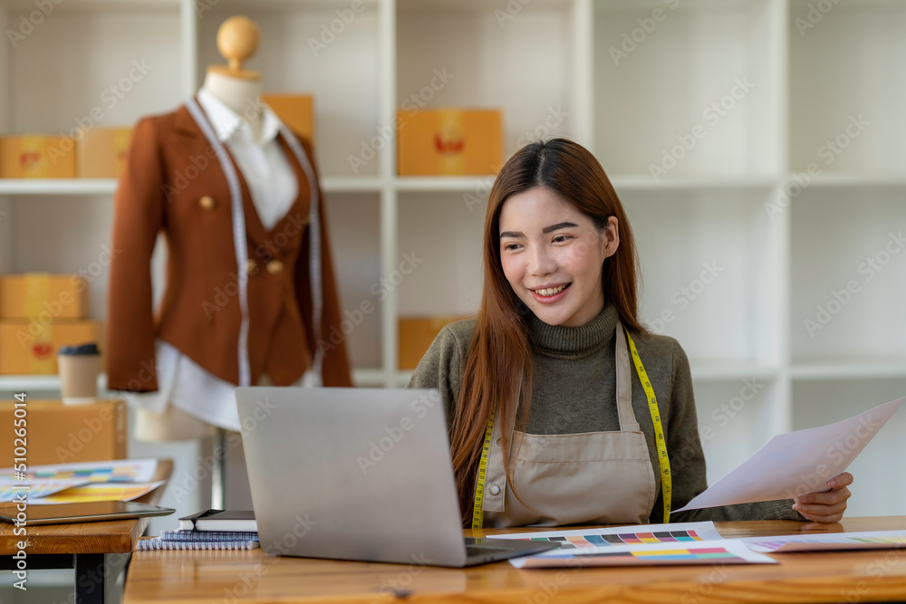 asian woman professional fashion designer working in modern office asian woman professional fashion designer working in modern office