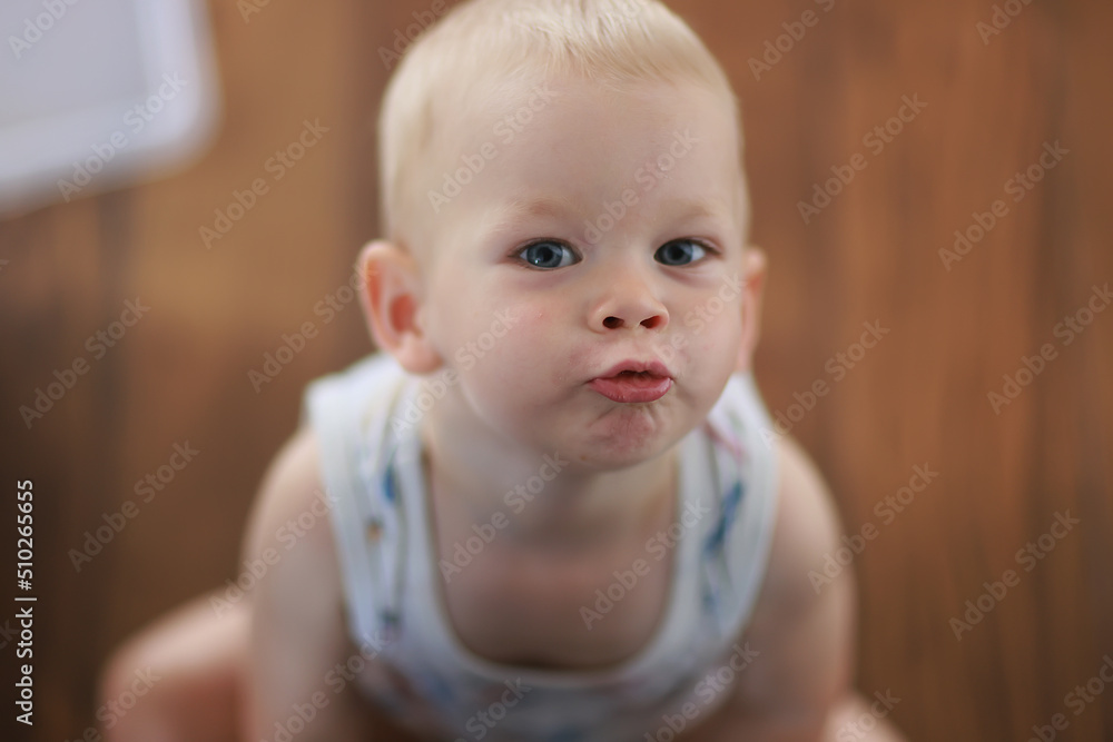 cheerful emotional portrait of a baby smile