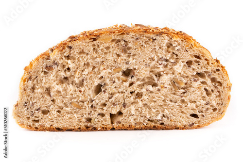 A slice of round yeast-free bread on a sourdough made of whole wheat flour with seeds on a white isolated background. Half a loaf of bread. Blank for the design. Proper nutrition.