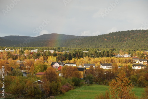 The scenery of Karasjok village in autumn with a rainbow, Norway