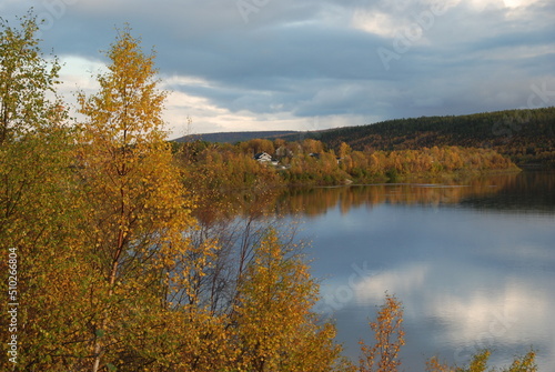 Karasjok village reflected in a river, Finnmark, Norway 